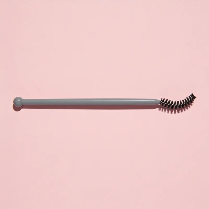 Curved-Head Spoolie — entire single brush
